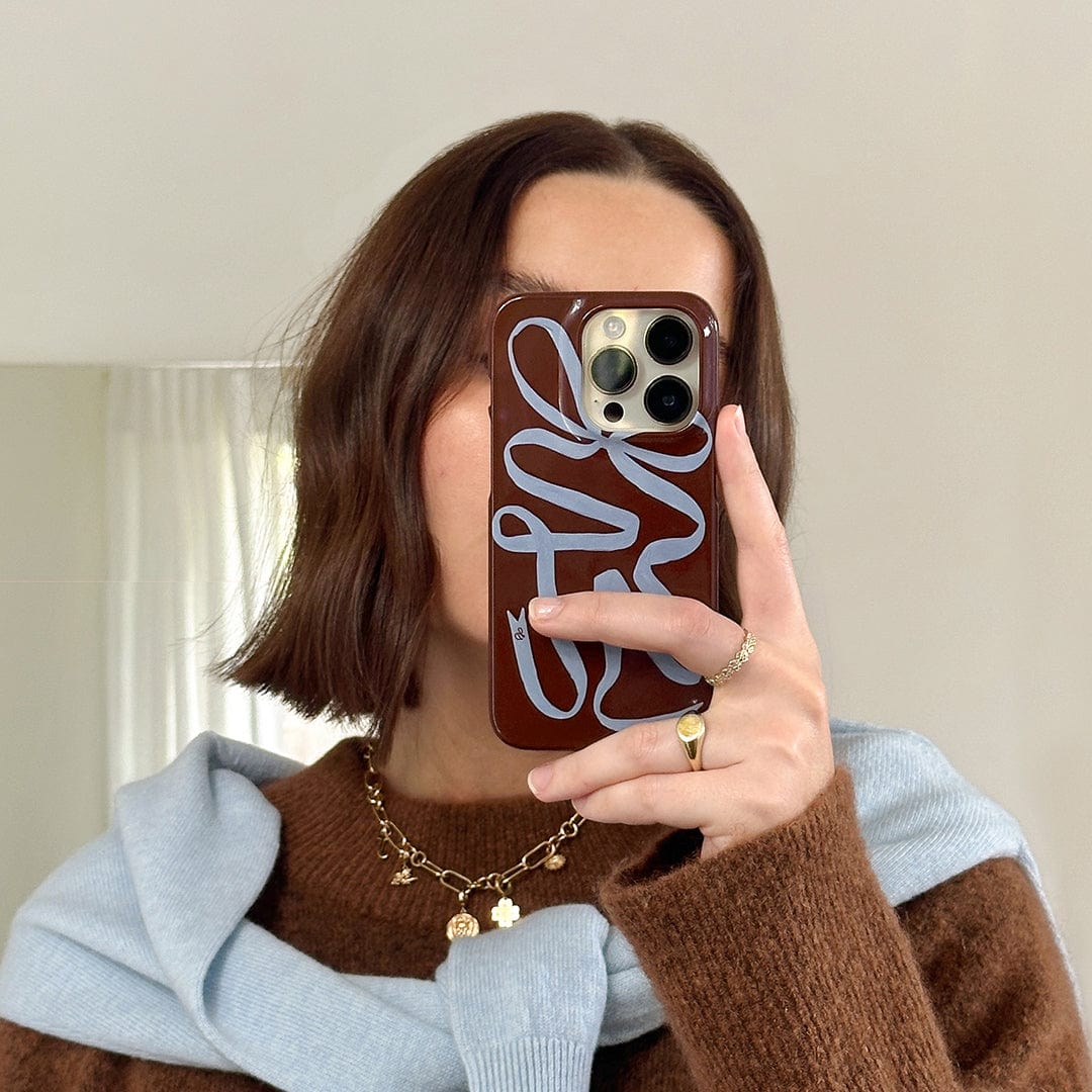 Ribbon-themed phone case collection by Jasmine Dowling for The Dairy, showcasing elegant and stylish designs